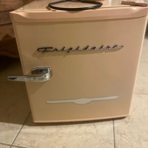 Pink mini fridge
